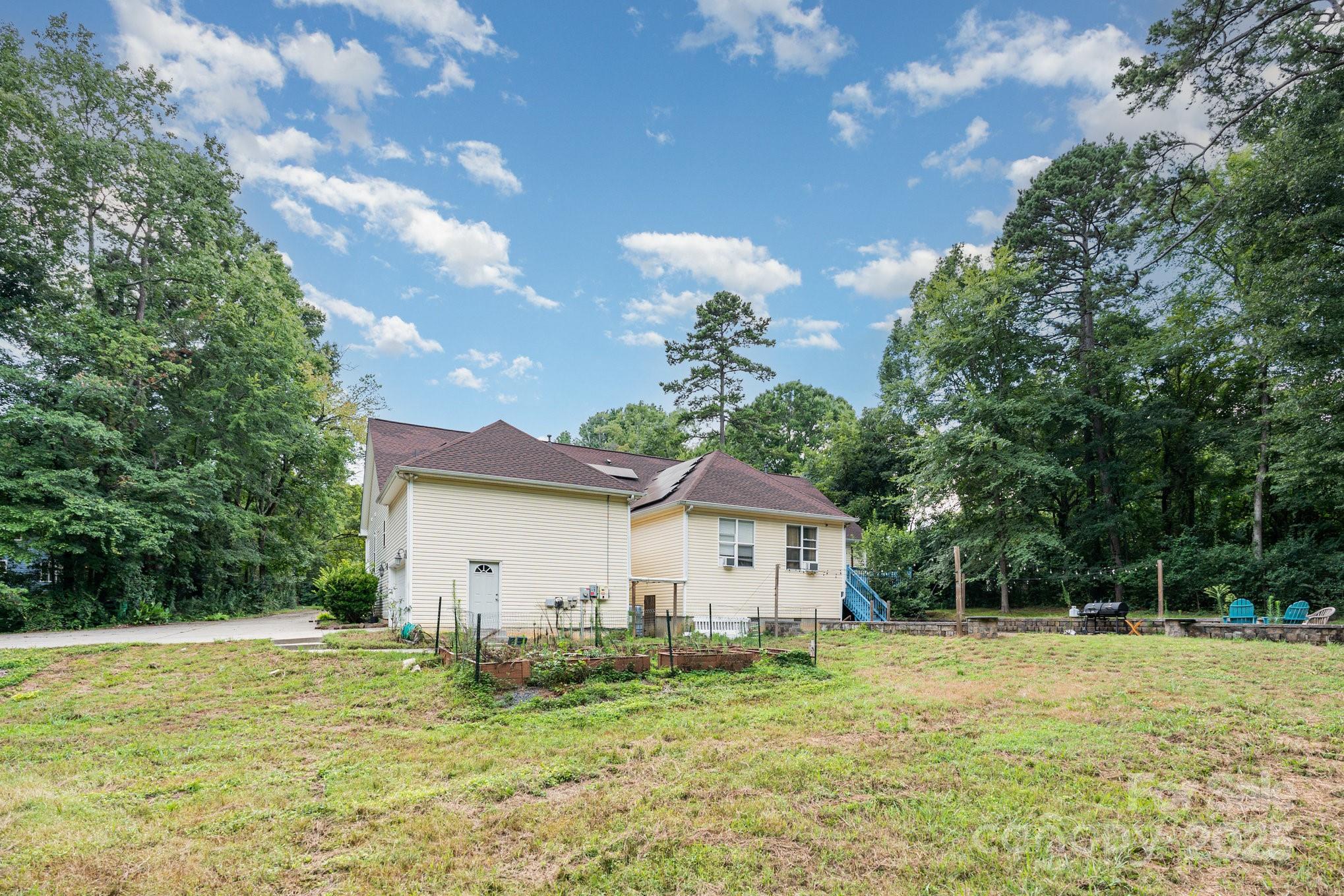 306 Nance Road Charlotte, NC 28214 - Photo 38 of 40 a front view of house with garden