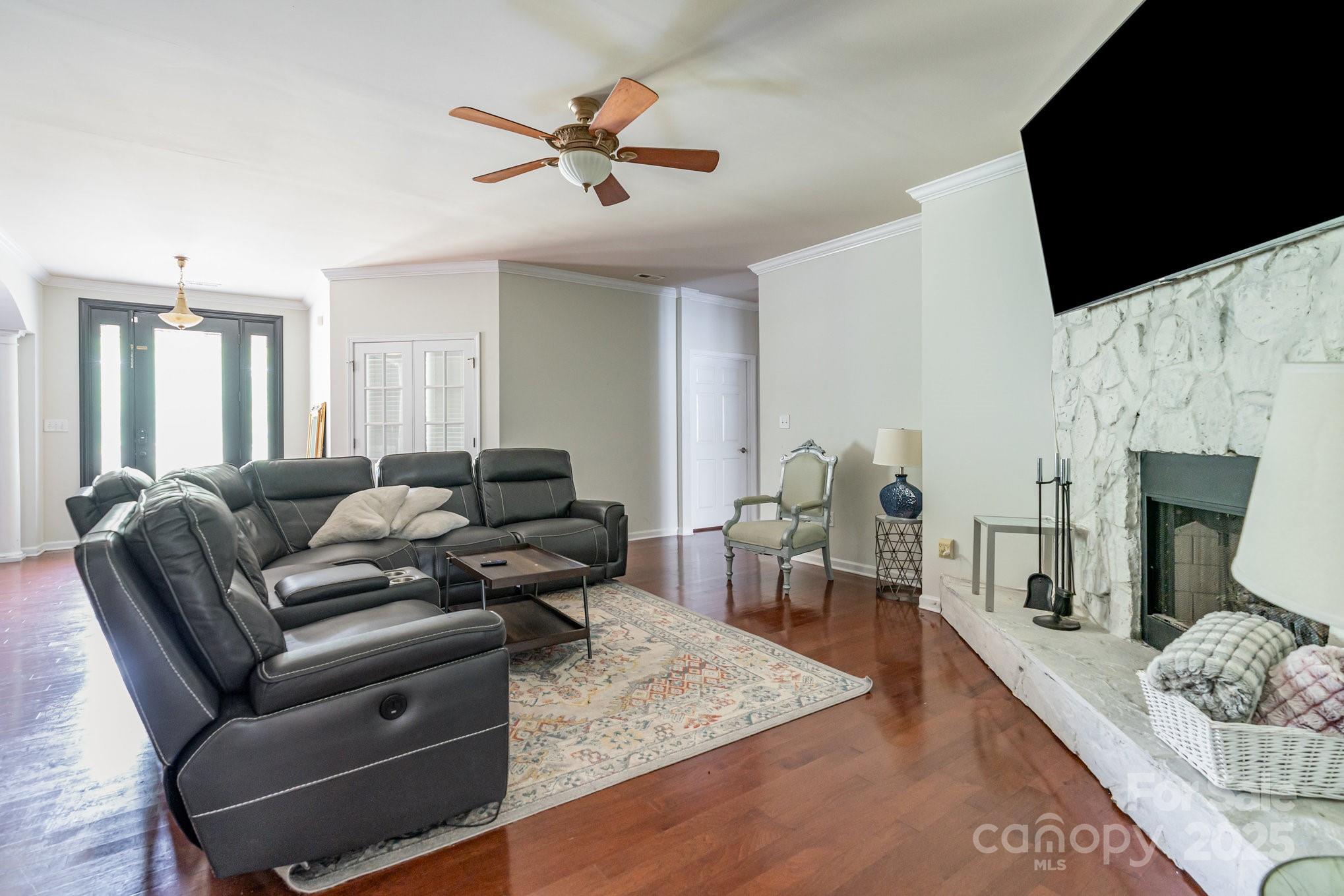 306 Nance Road Charlotte, NC 28214 - Photo 9 of 40 a living room with furniture and a flat screen tv
