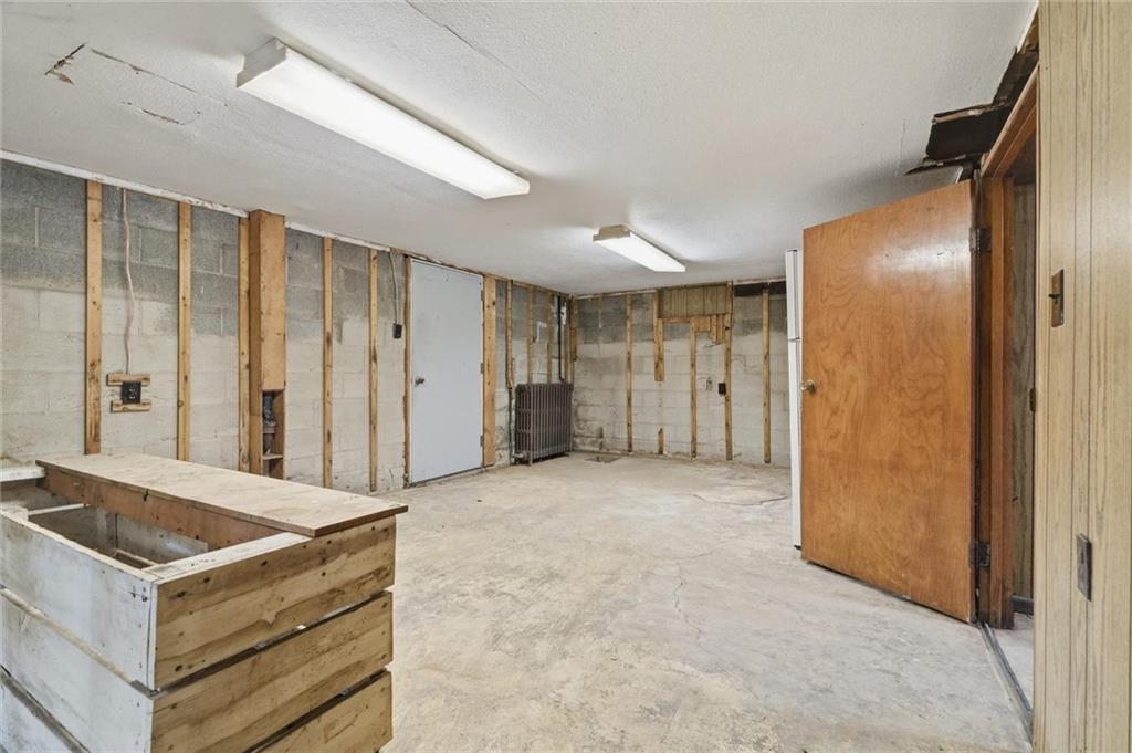 80 Main Street Taylorstown, PA 15323 - Photo 29 of 40 The back storage room could be opened up into the game room or...