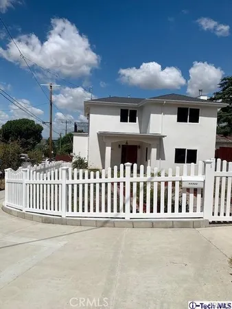 a view of a porch with furniture
