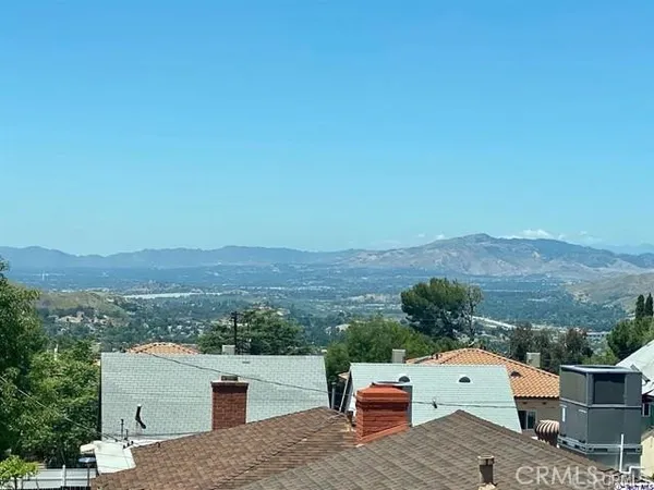 an aerial view of a house with a outdoor space