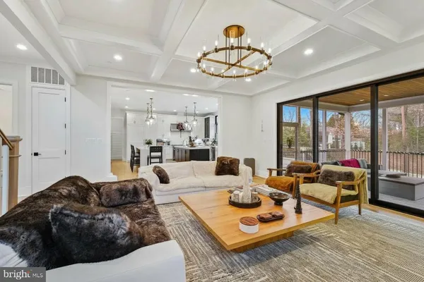a kitchen with sink cabinets and wooden floor