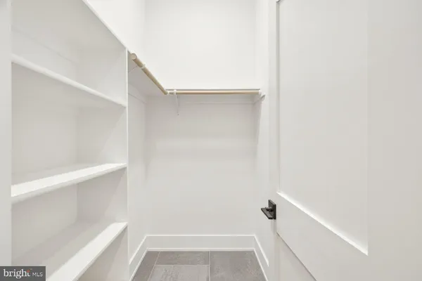 a view of a large window with wooden floor