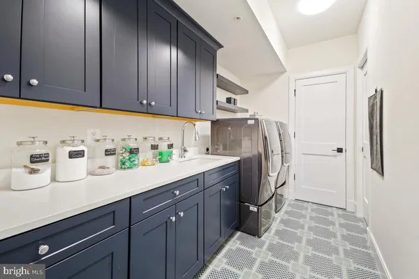 a front view of a building with a garden