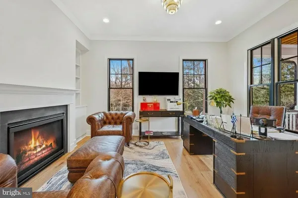 a view of kitchen with furniture and wooden floor