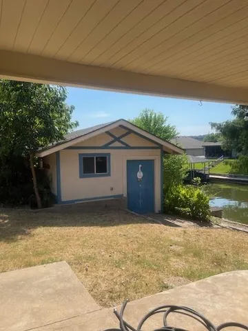 a house view with a backyard space