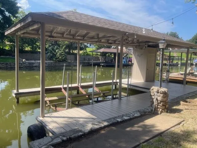 a view of a swimming pool with a patio