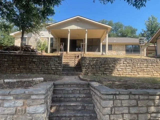 a view of house with outdoor space