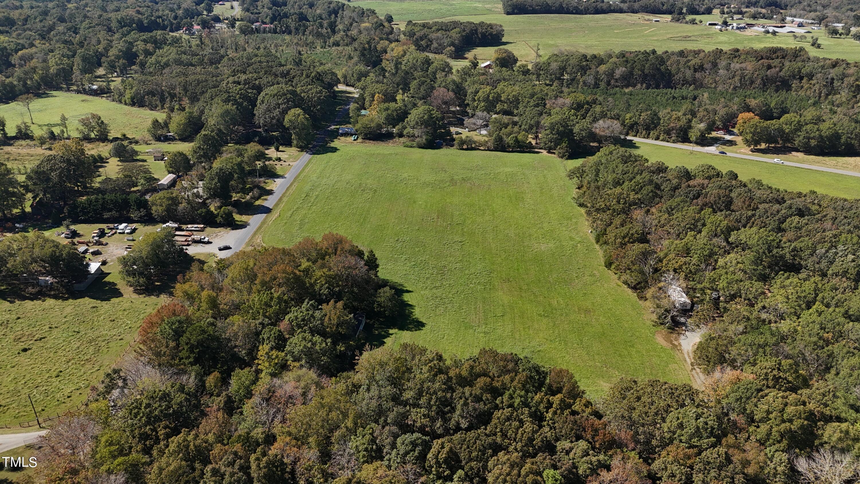 125 George Hudson Road Siler City, NC 27344 - Photo 3 of 16 dji_fly_20241013_134220_0212_17288589133