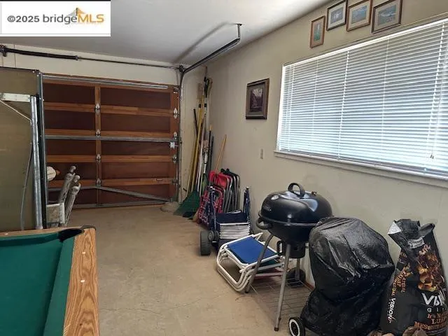 a room with furniture and a window