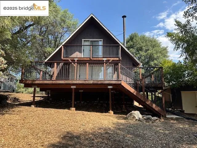 a front view of house with street