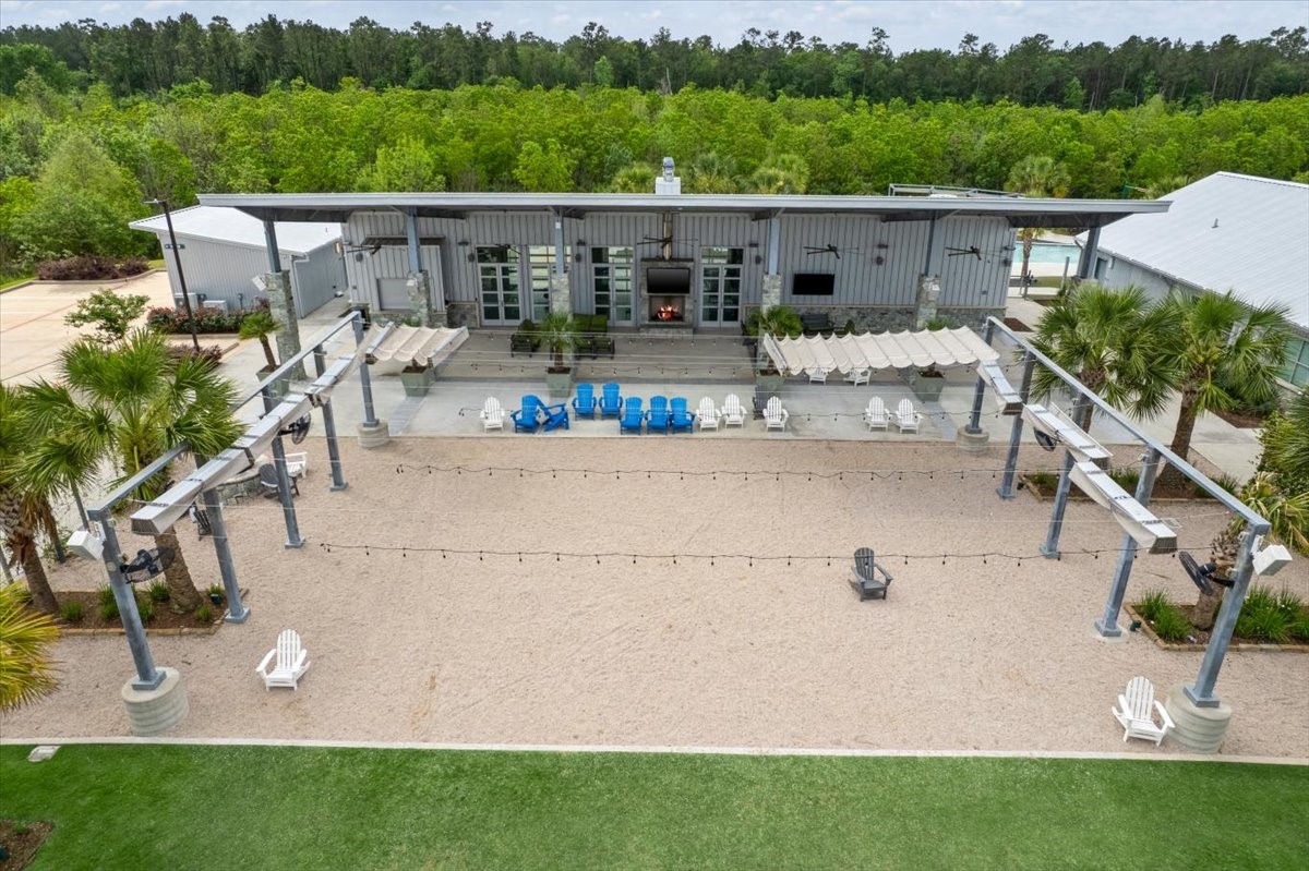 17814 Tree Of Heaven Conroe, TX 77385 - Photo 31 of 48 A pavilion and event lawn with retractable solar shade panels