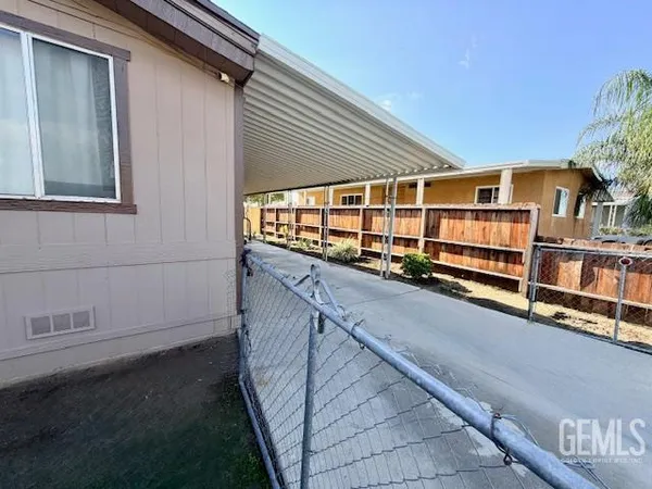 a view of a backyard of the house