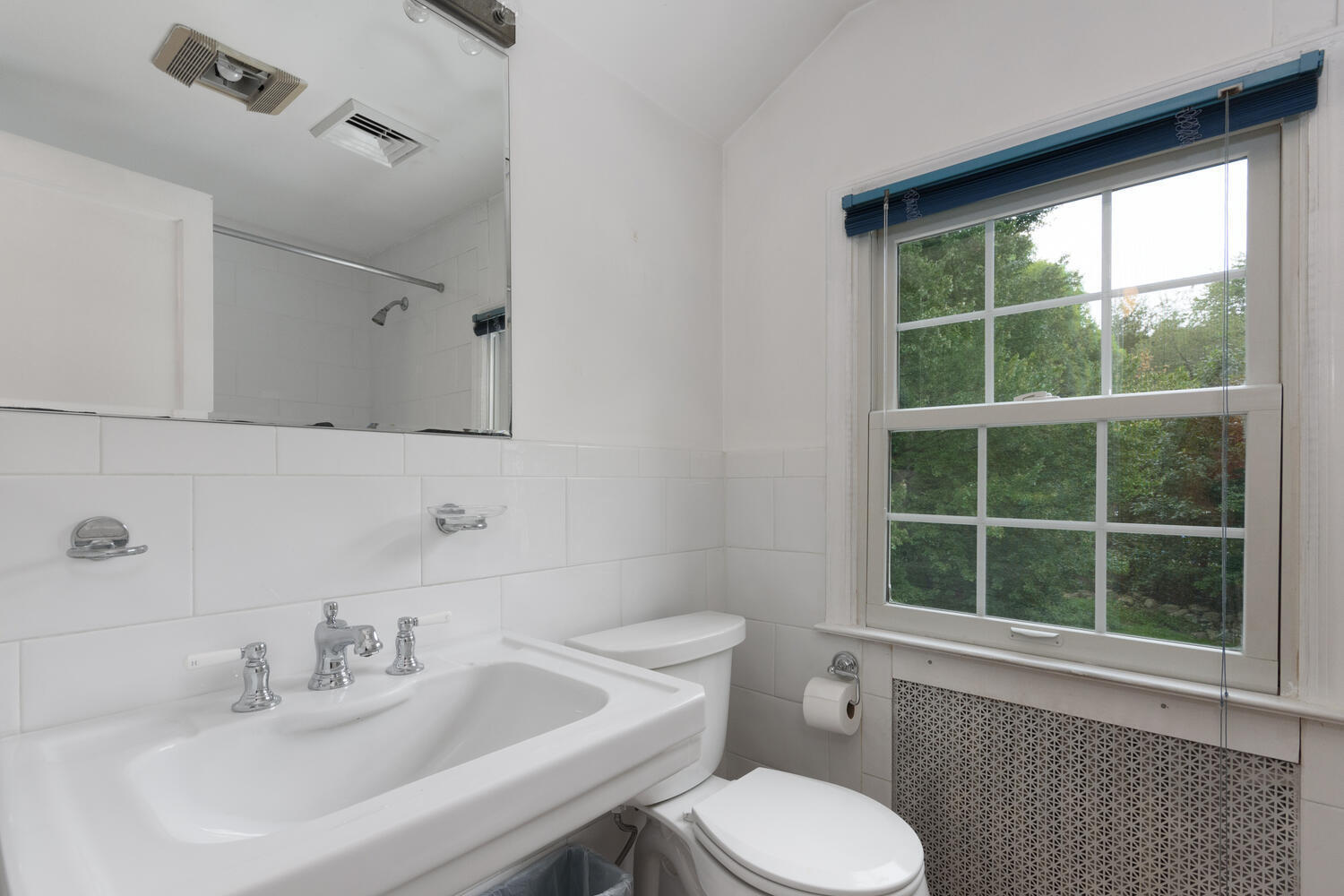 15 Miles Road Darien, CT 06820 - Photo 16 of 23 a bathroom with a sink toilet and mirror