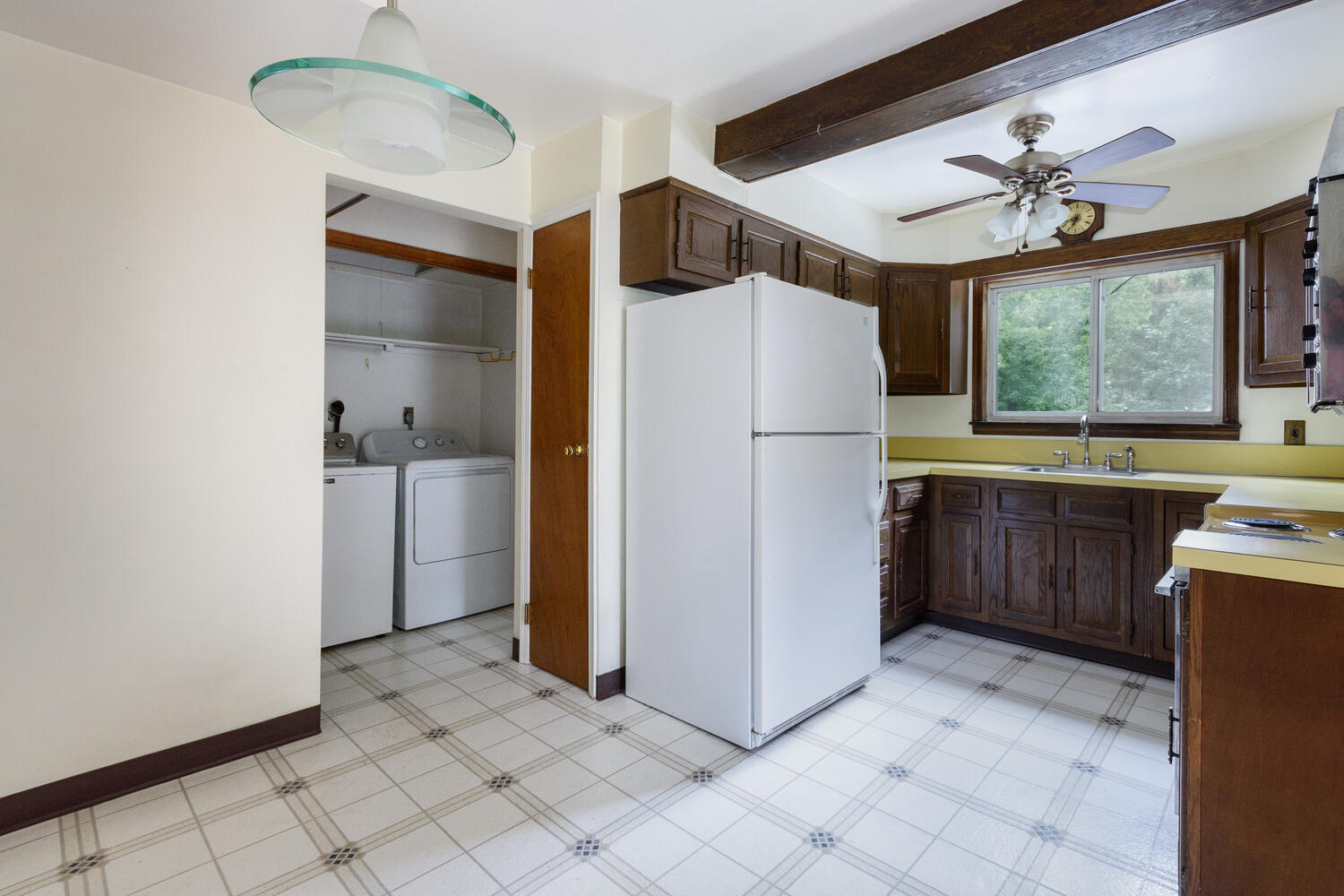 15 Miles Road Darien, CT 06820 - Photo 8 of 23 a kitchen with stainless steel appliances a refrigerator and a stove