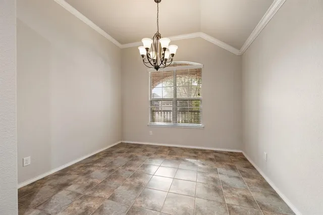 a view of a chandelier in a room