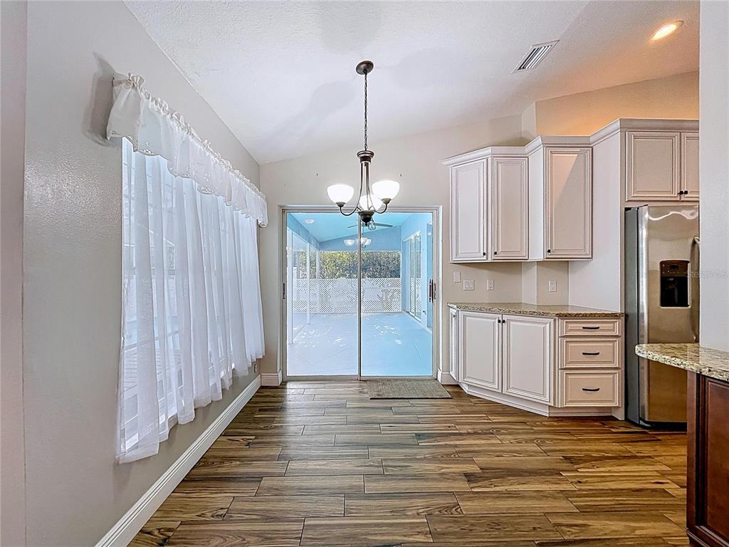 18812 Bascomb Lane Hudson, FL 34667 - Photo 35 of 57 a view of a kitchen with electric appliances
