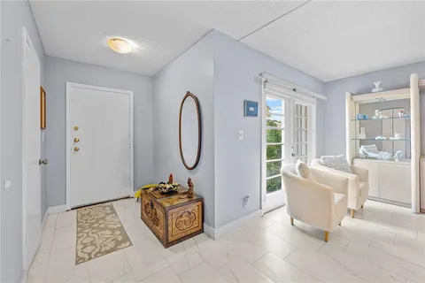 a bathroom with a sink a mirror and a toilet