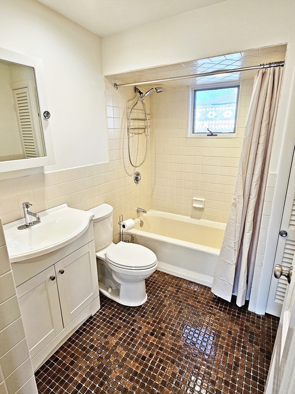 11 Channing Street, Unit 2 Newton, MA 02458 - Photo 24 of 27 a bathroom with a sink toilet and shower