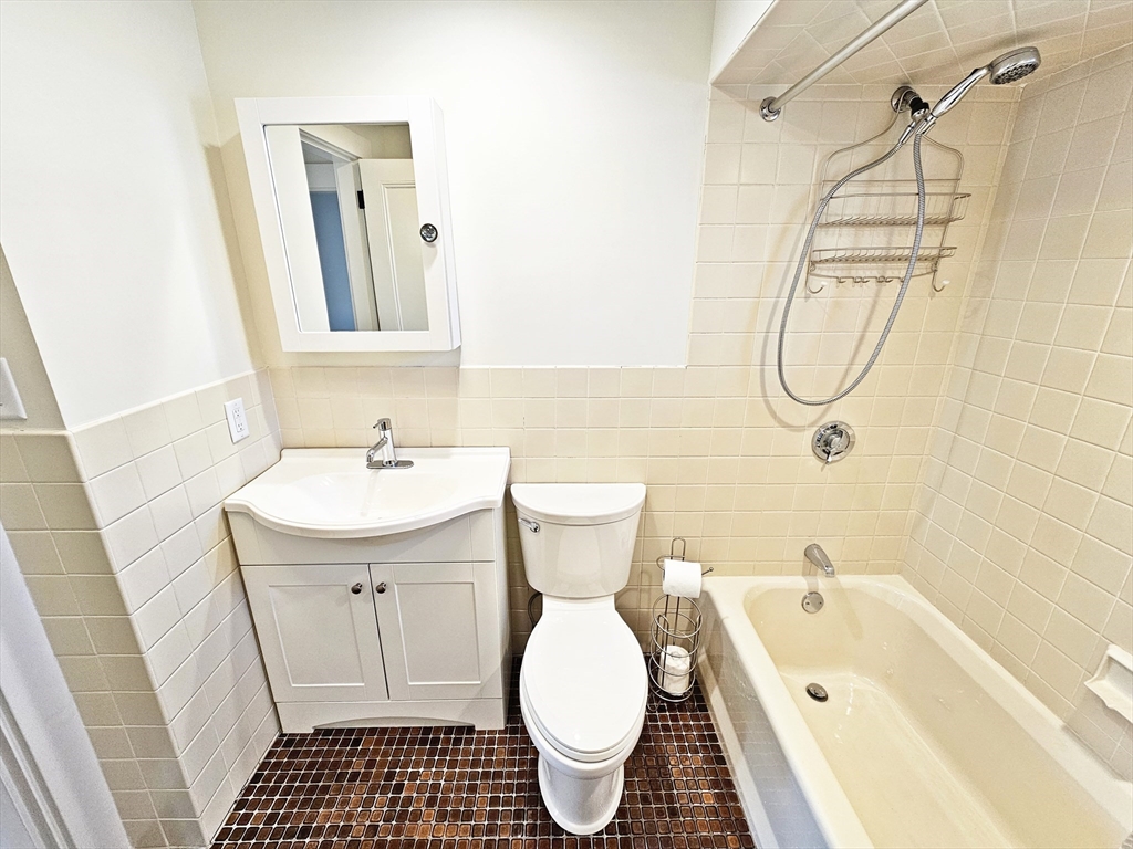 11 Channing Street, Unit 2 Newton, MA 02458 - Photo 26 of 27 a bathroom with a sink toilet and shower