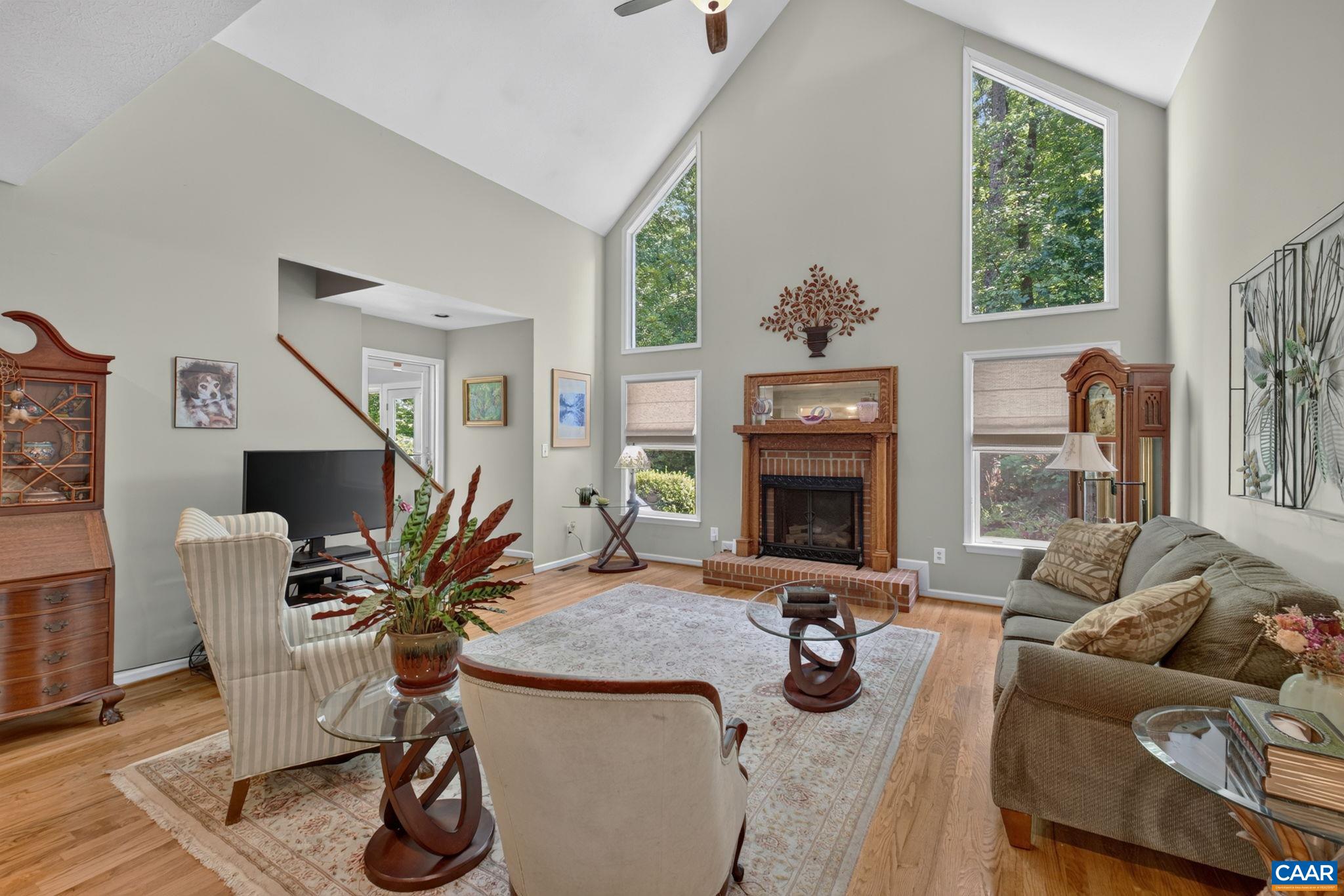5363 Stony Point Road Barboursville, VA 22923 - Photo 24 of 66 This spacious room features a cathedral with with a loft overlooking it plus a propane gas fueled Fire Place with an antique frame (easily removed if not your taste) View also shows the doorway into the Four Season room.