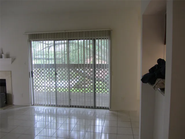 a view of a living room with a flat screen tv