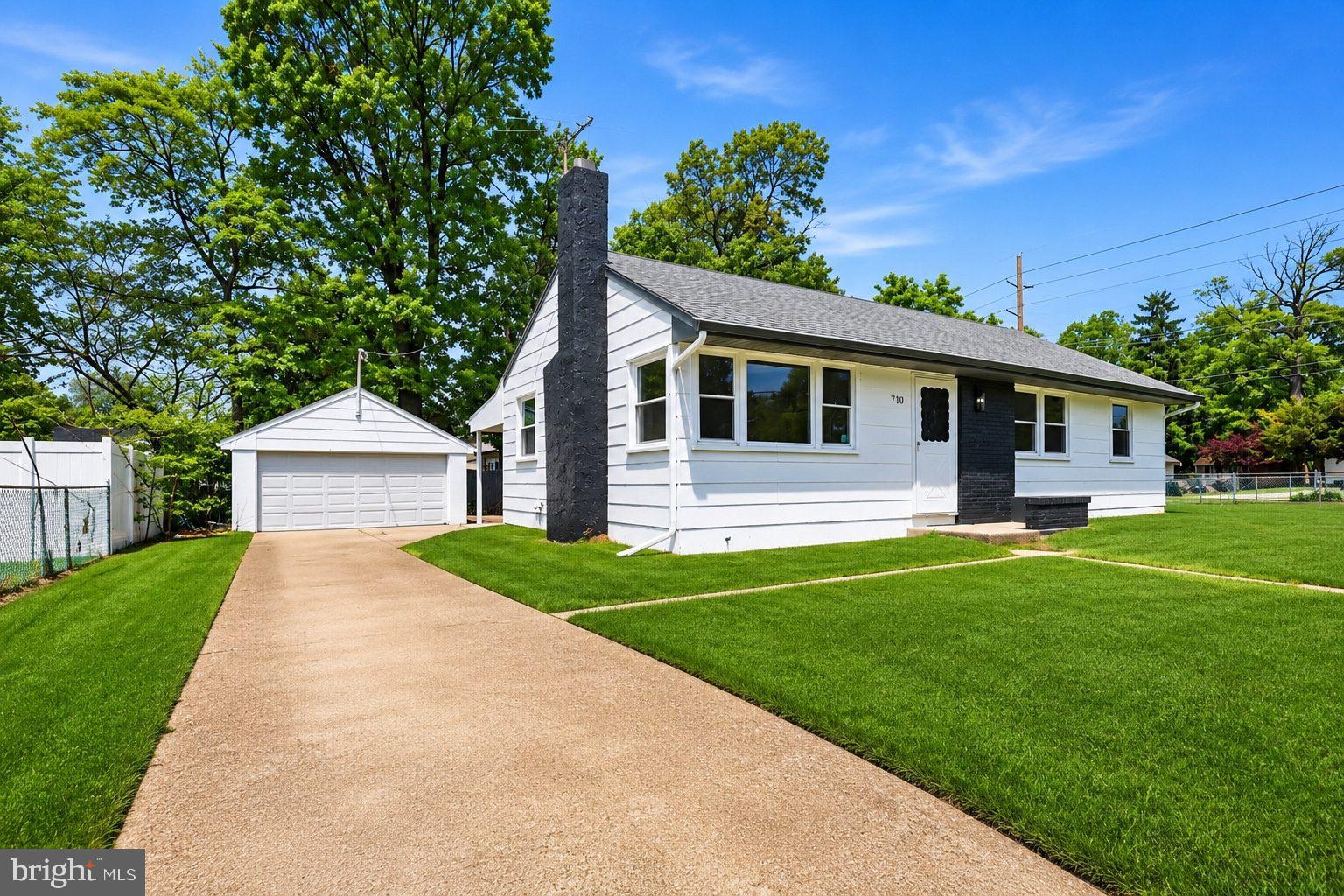 710 East Gibbsboro Road Lindenwold, NJ 08021 - Photo 2 of 21 a front view of a house with a yard