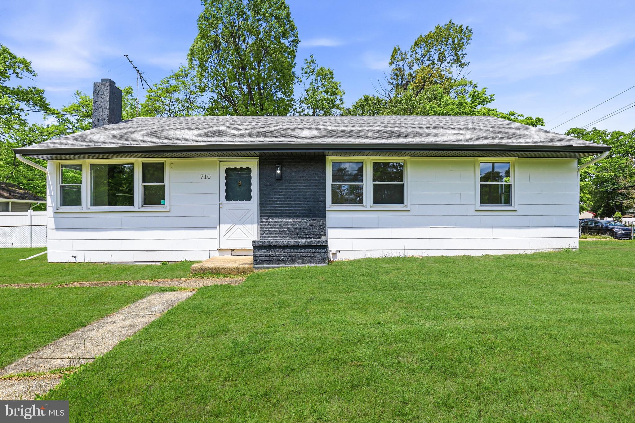 710 East Gibbsboro Road Lindenwold, NJ 08021 - Photo 5 of 21 a front view of a house with a yard