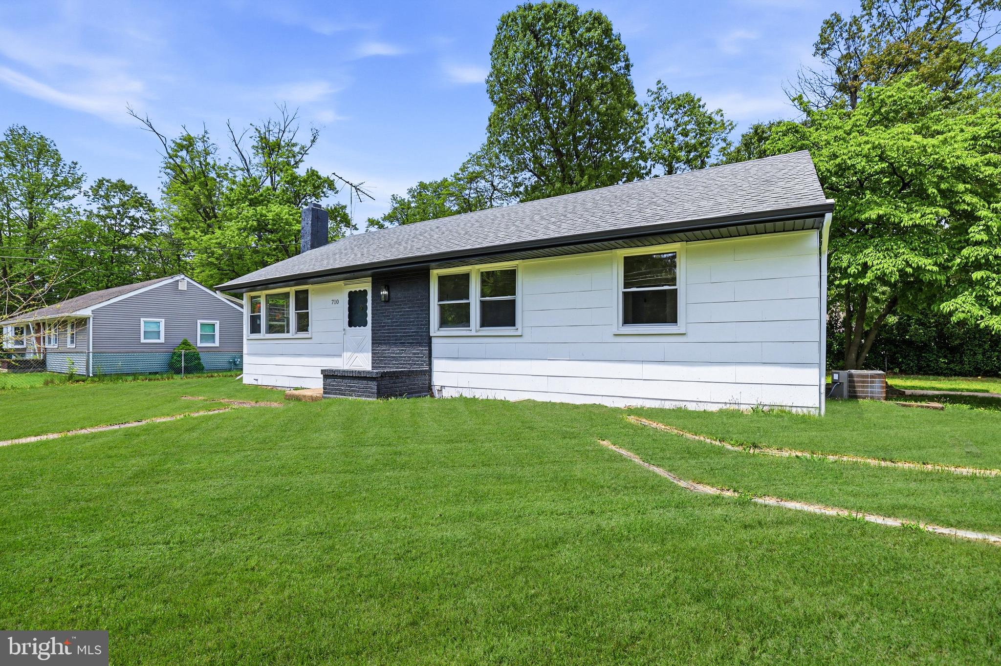 710 East Gibbsboro Road Lindenwold, NJ 08021 - Photo 6 of 21 a front view of a house with a yard