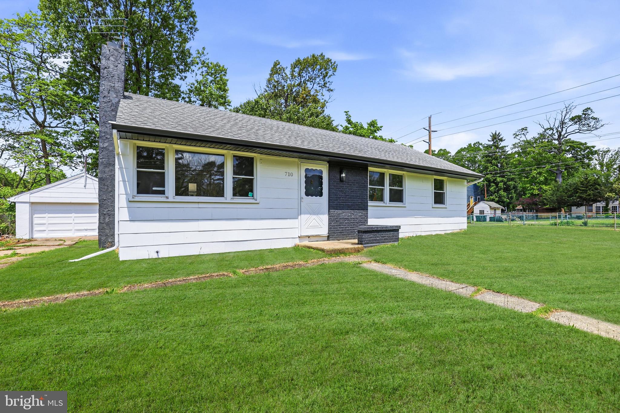 710 East Gibbsboro Road Lindenwold, NJ 08021 - Photo 7 of 21 a front view of a house with a yard