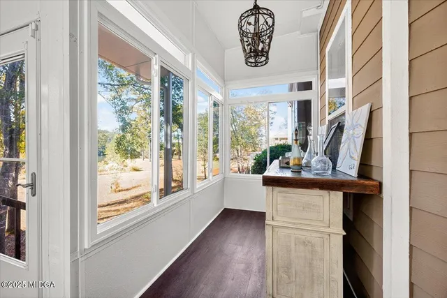 a view of living room with furniture and window