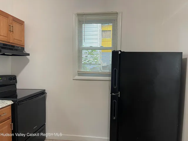 a view of kitchen and utility room