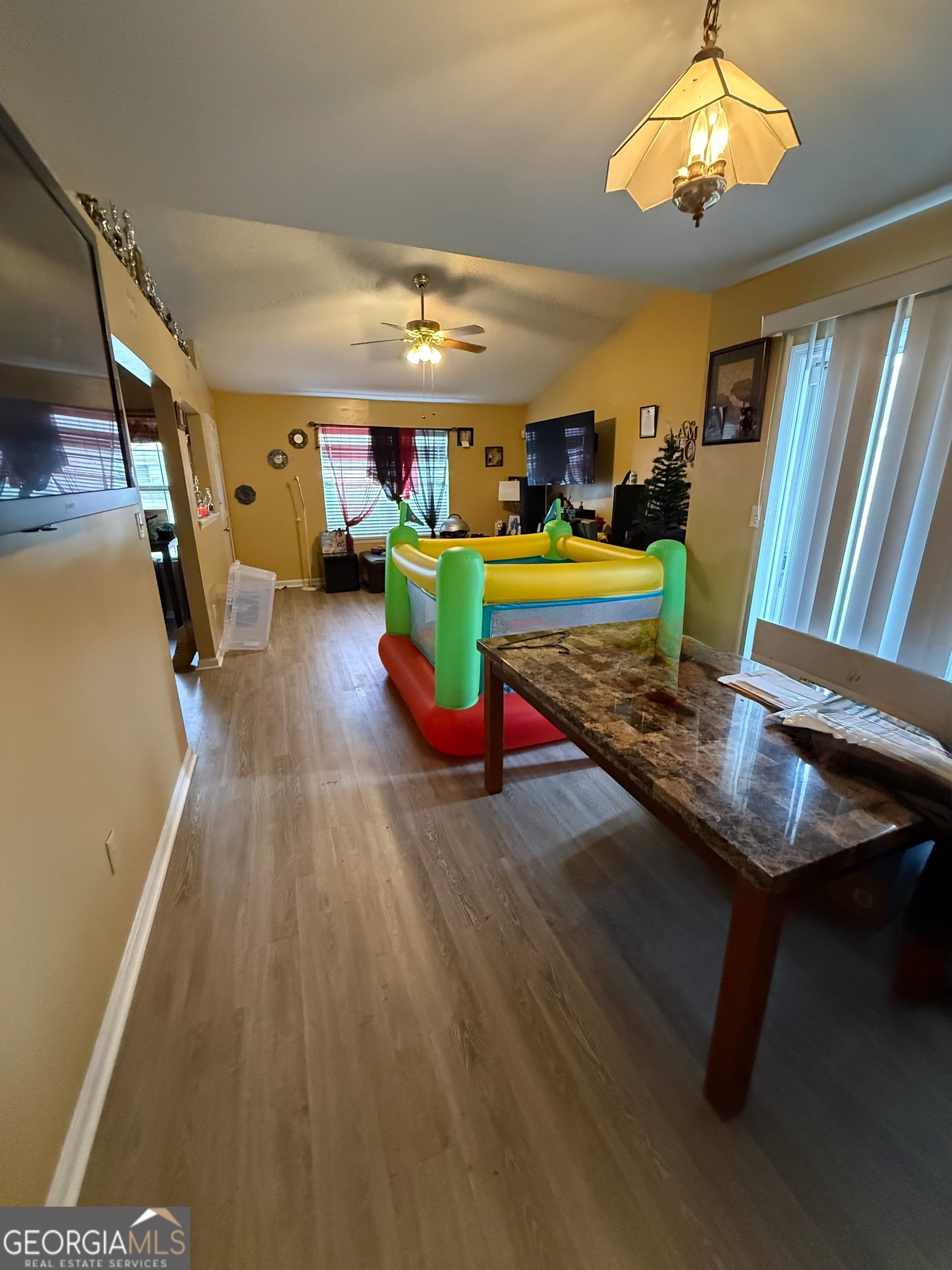 212 Dunmurry Place Warner Robins, GA 31093 - Photo 12 of 21 a room with wooden floor pool table and windows