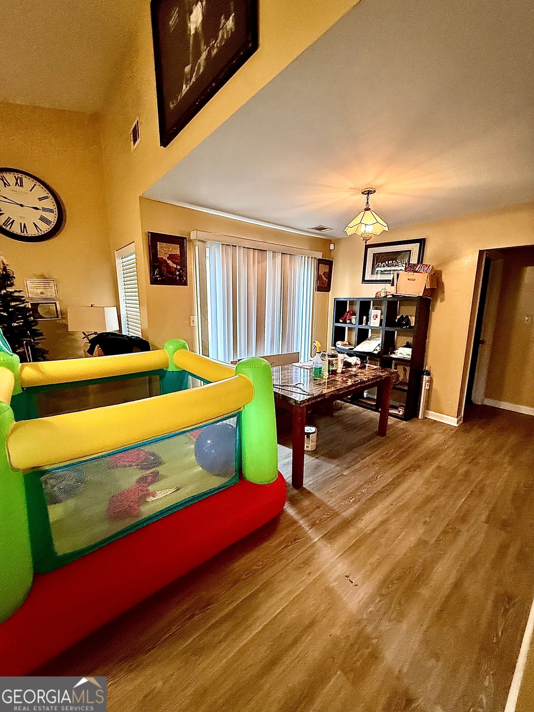 212 Dunmurry Place Warner Robins, GA 31093 - Photo 13 of 21 a living room with furniture and a flat screen tv