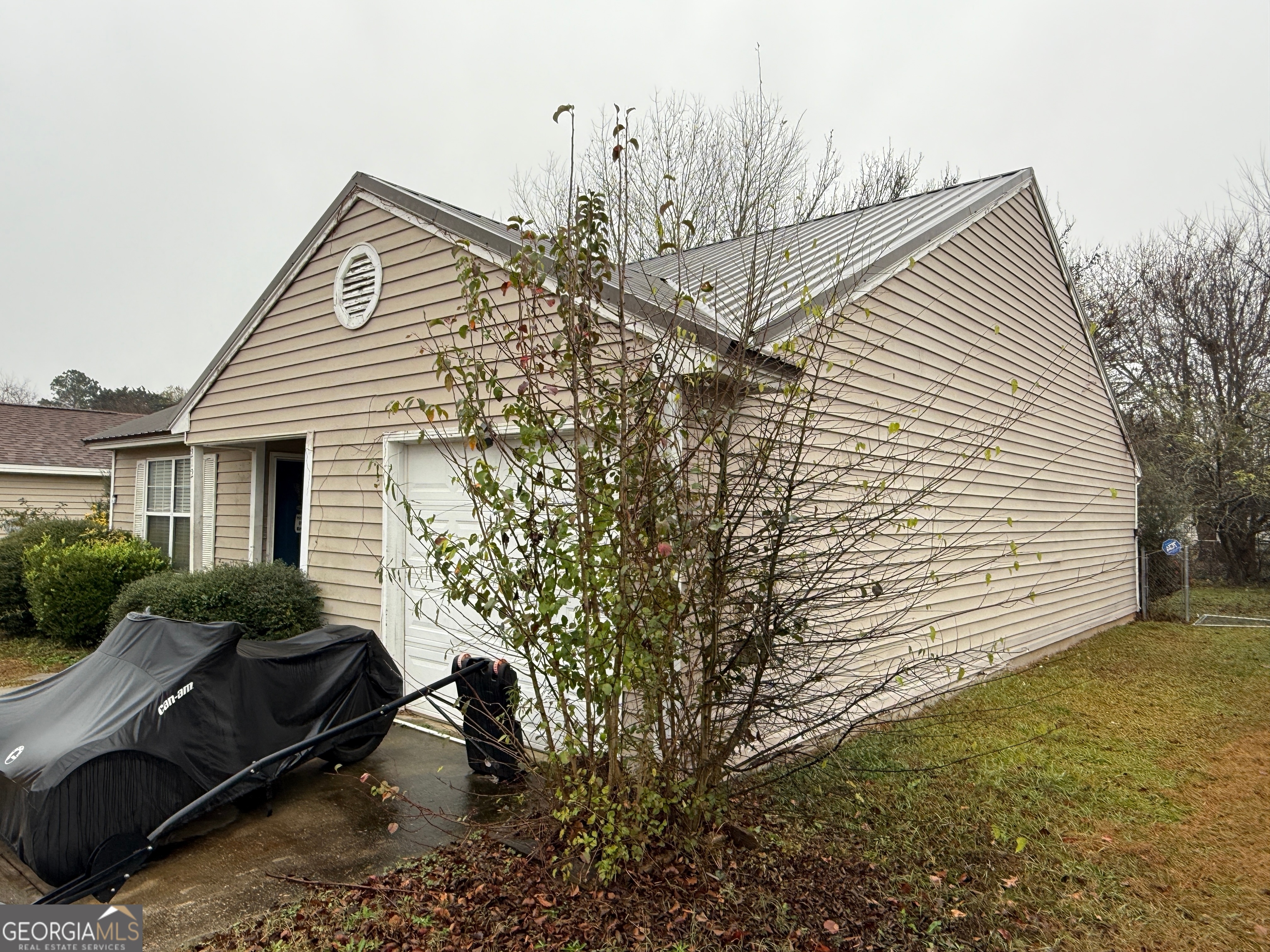 212 Dunmurry Place Warner Robins, GA 31093 - Photo 5 of 21 a view of a house with a yard