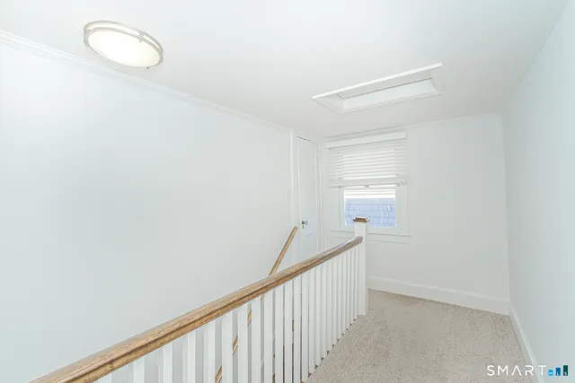a view of a hallway with window