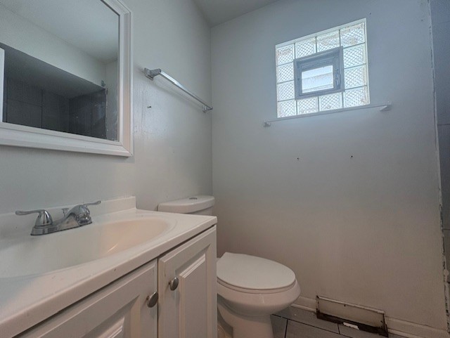 6542 South Carpenter Street Chicago, IL 60621 - Photo 7 of 17 a bathroom with a sink toilet and vanity