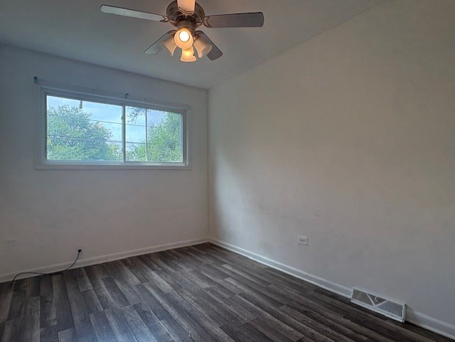 6542 South Carpenter Street Chicago, IL 60621 - Photo 10 of 17 an empty room with a window