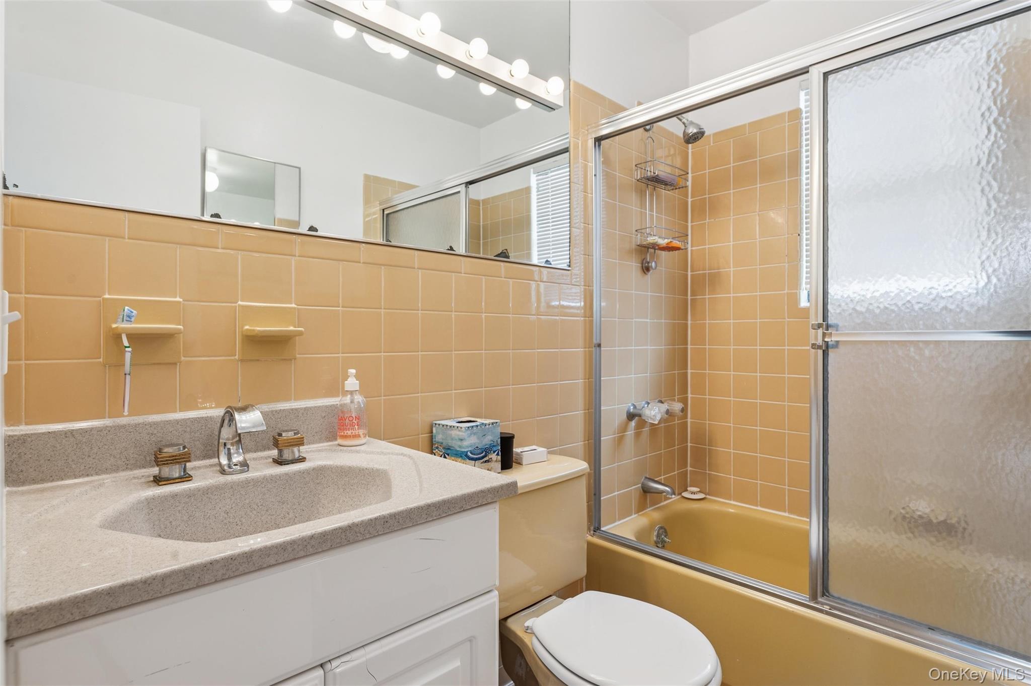 630 Dune Road Westhampton, NY 11978 - Photo 10 of 14 a bathroom with a sink toilet and shower