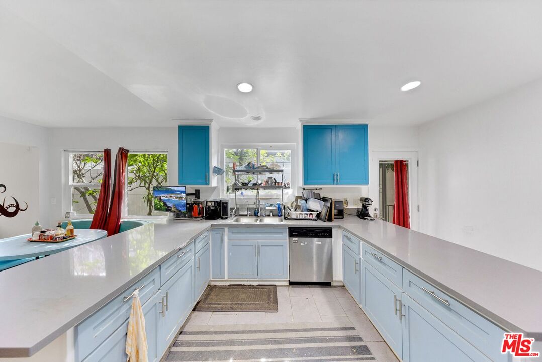 8600 La Tuna Canyon Road Sun Valley, CA 91352 - Photo 22 of 60 a kitchen with sink cabinets and counter space