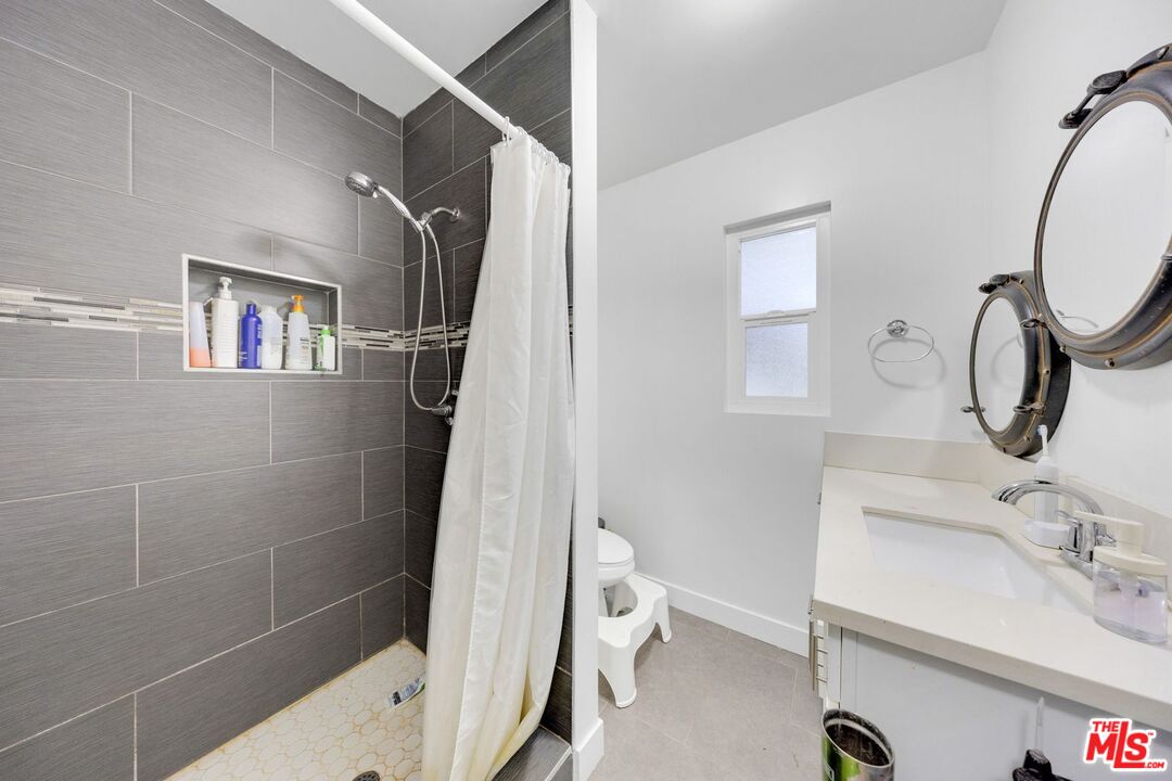 8600 La Tuna Canyon Road Sun Valley, CA 91352 - Photo 35 of 60 a bathroom with a sink toilet and shower
