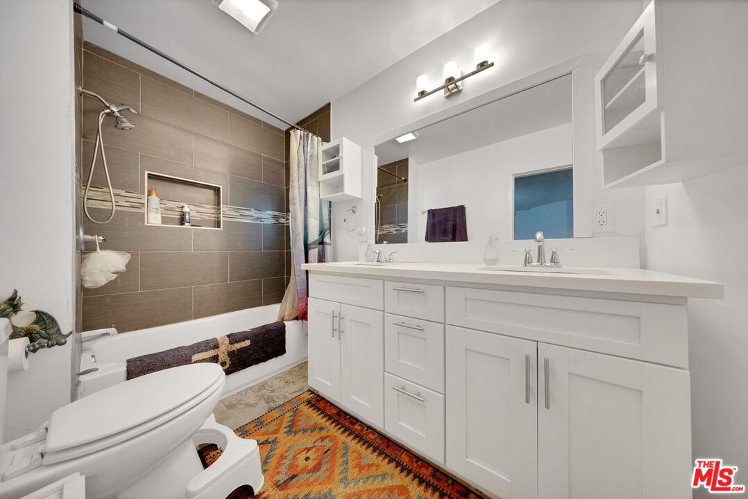 8600 La Tuna Canyon Road Sun Valley, CA 91352 - Photo 43 of 60 a bathroom with a sink double vanity