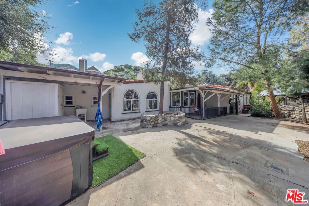 8600 La Tuna Canyon Road Sun Valley, CA 91352 - Photo 45 of 60 a front view of a house with a yard and garage