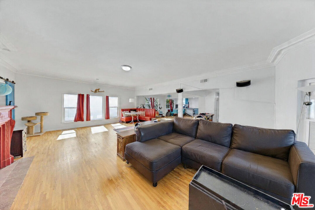 8600 La Tuna Canyon Road Sun Valley, CA 91352 - Photo 7 of 60 a living room with furniture and a wooden floor