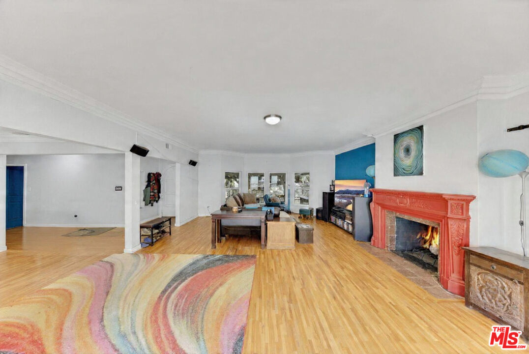 8600 La Tuna Canyon Road Sun Valley, CA 91352 - Photo 10 of 60 a living room with furniture and a wooden floor
