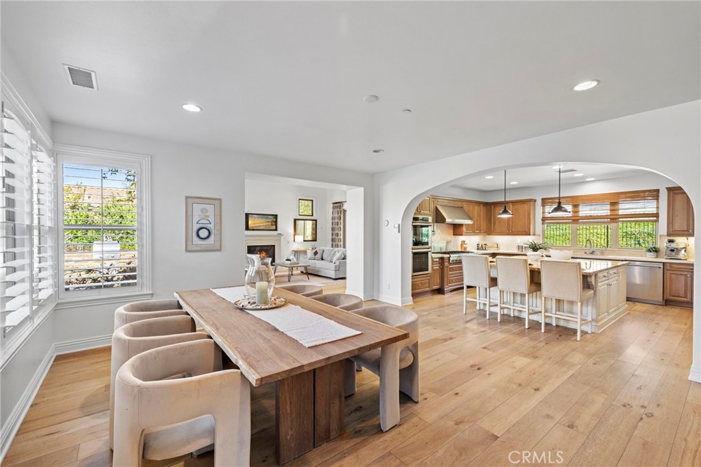 10 Gaucho Road Ladera Ranch, CA 92694 - Photo 12 of 52 a living room with furniture a fireplace and a large window