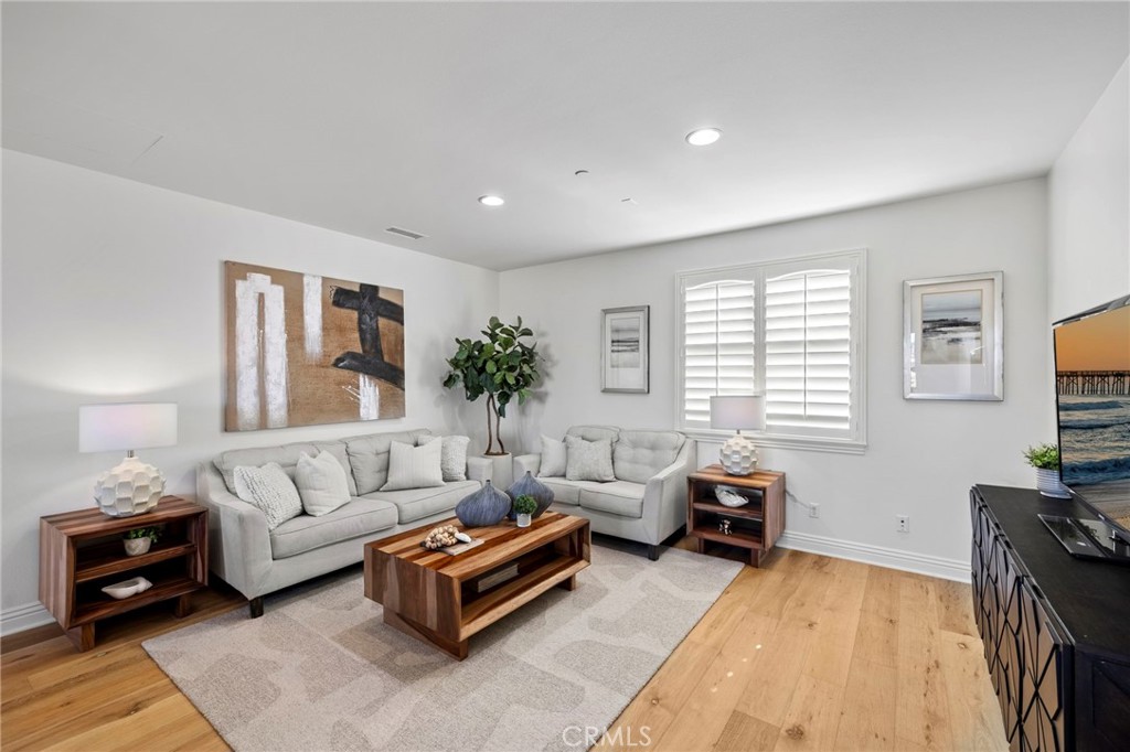10 Gaucho Road Ladera Ranch, CA 92694 - Photo 15 of 52 a living room with furniture and a flat screen tv