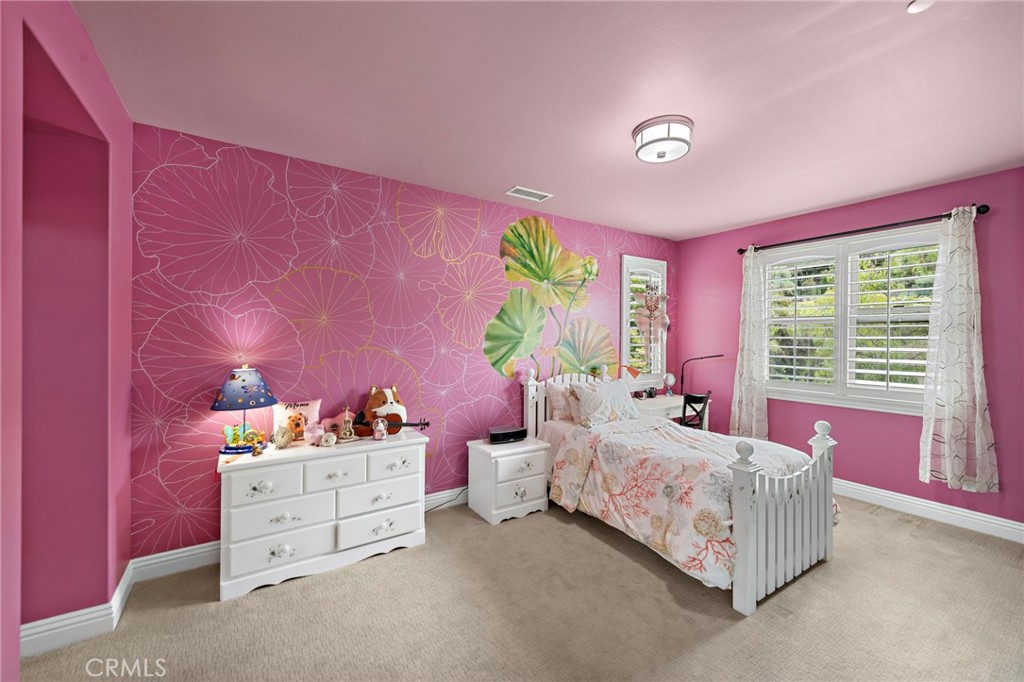 10 Gaucho Road Ladera Ranch, CA 92694 - Photo 25 of 52 a bedroom with a bed and a window