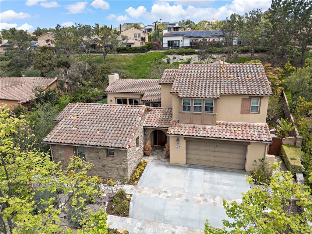 10 Gaucho Road Ladera Ranch, CA 92694 - Photo 40 of 52 an aerial view of a house with a garden and deck