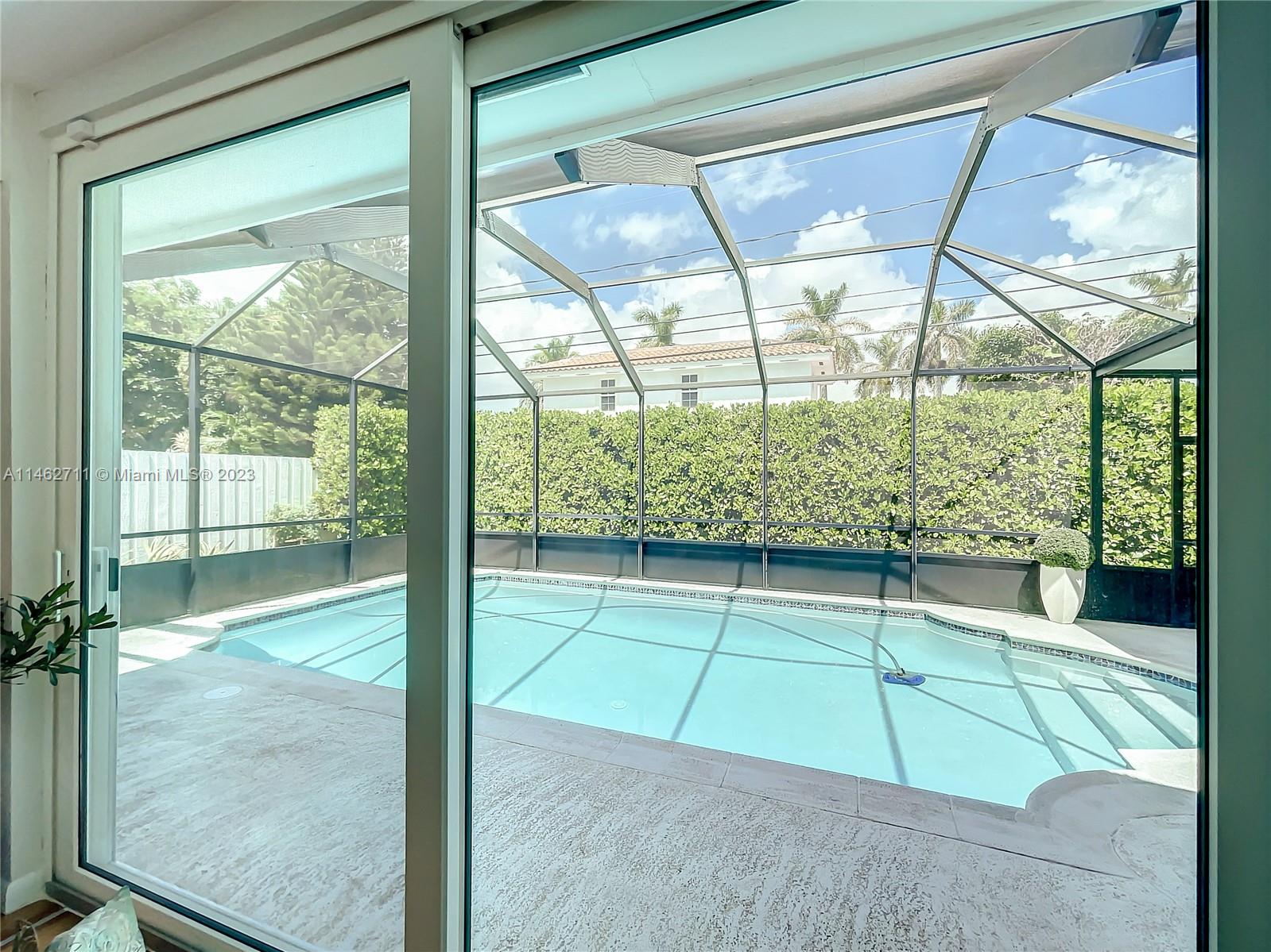 9035 Southwest 48th Terrace Miami, FL 33165 - Photo 17 of 37 a room with window